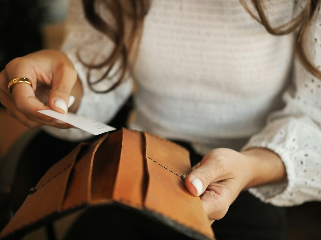 person checking wallet