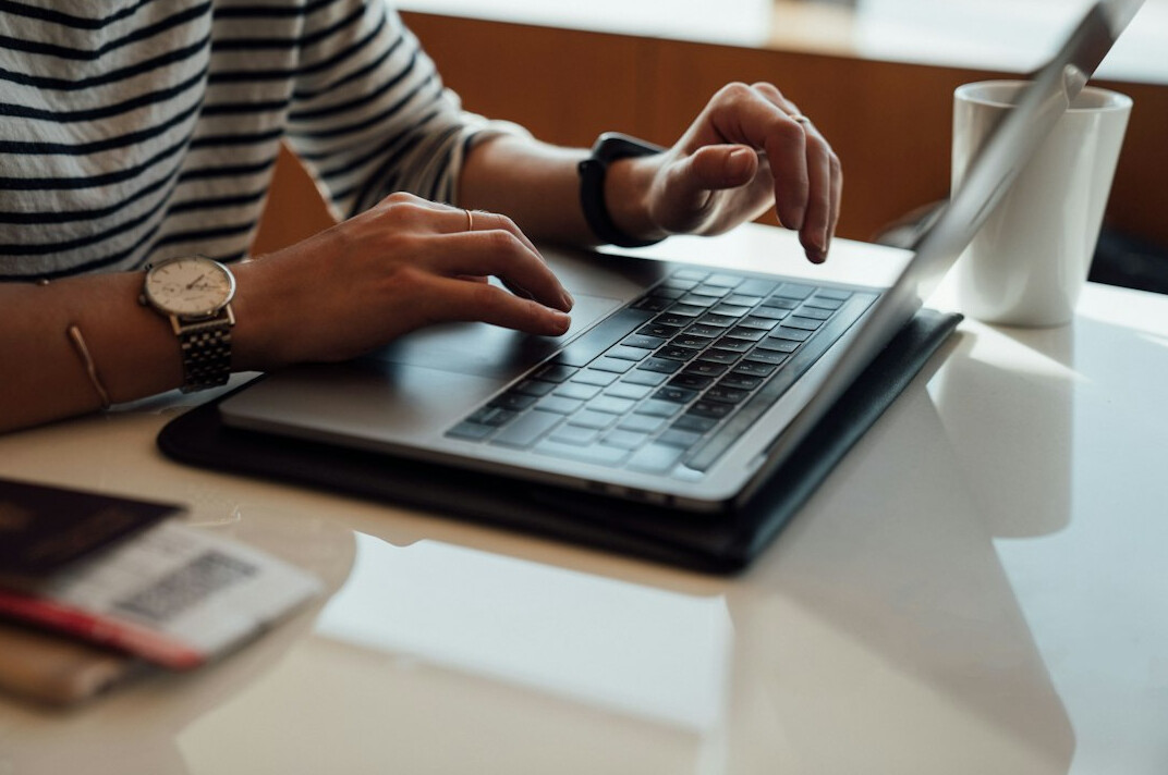 person reviewing budget on laptop
