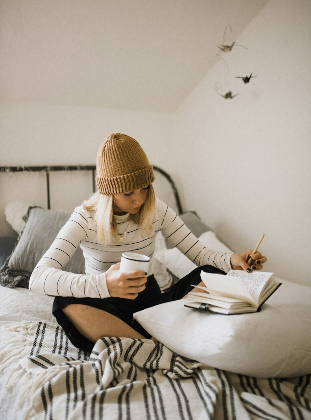 woman writing in notebook