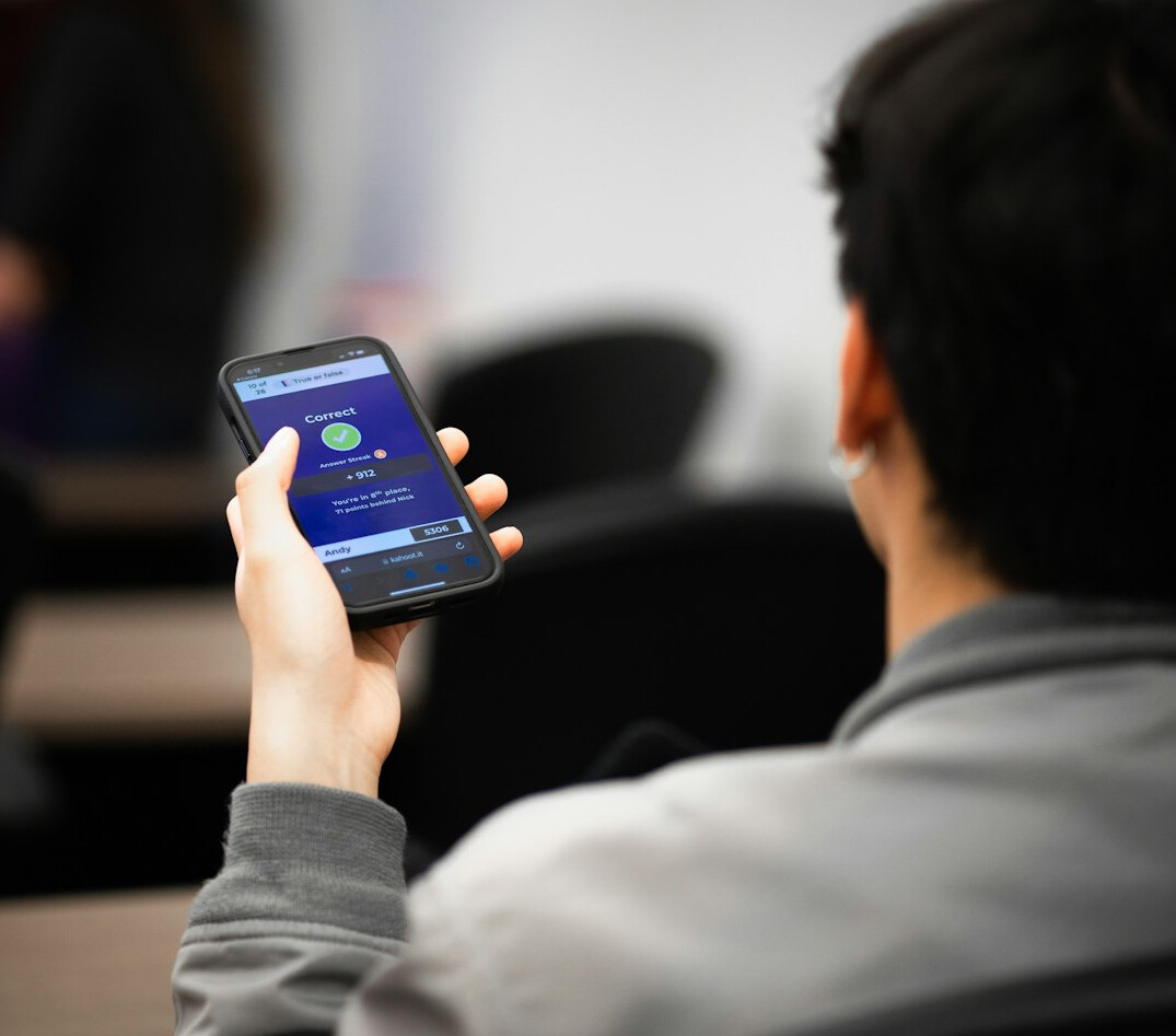 person checking bank app on phone