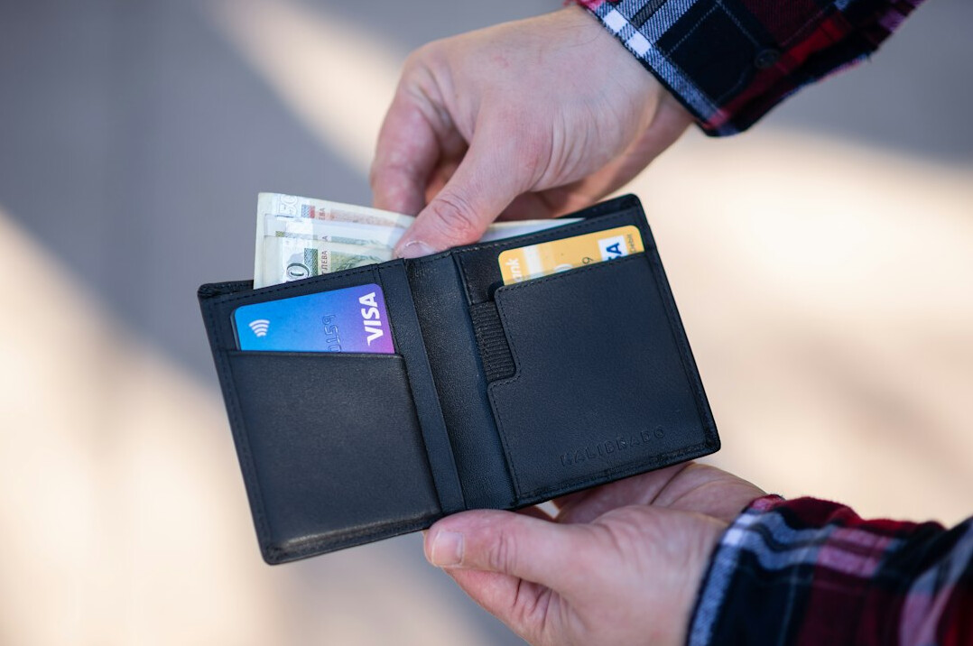 person checking wallet